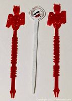 Three stir sticks side by side