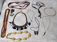 All ten necklaces laid out for overview