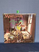 Front view of Marillion Script for a Jester's Tear vinyl LP showing cover art and condition