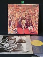 Front jacket artwork and inner sleeve with record partially visible