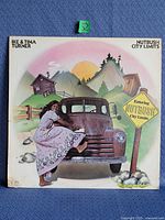 Front jacket with album art and artist/title visible