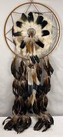 Full view of 50" dreamcatcher showing hoop, web, fur rosette and feather strands
