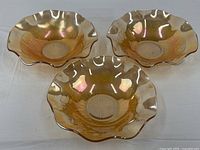 Three Jeannette Iris Herringbone bowls top view