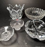 All five crystal and glass pieces arranged together