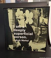 Front view of framed print showing photo and quote text