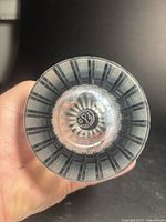 Base showing Baccarat France acid-etched mark and radial cuts