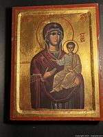 Full view of wood icon showing Madonna and Child on gold field