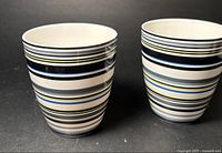 Front view of both striped cups