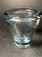 Small conical clear pale blue glass vase