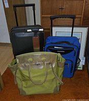 Overall view of the three luggage pieces standing together