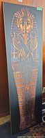 Full view of framed Tutankhamun sarcophagus panel