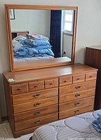 Front view of dresser with attached mirror