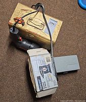 Overall lot showing drills, hole saw case, boxed sander