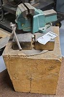 Fabrex bench vise attached to wood block showing overall condition