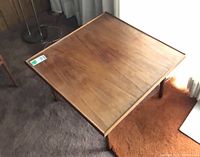 Top view of teak square side table showing grain and light stains