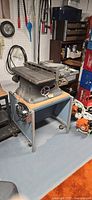 Full view of Beaver table saw on stand