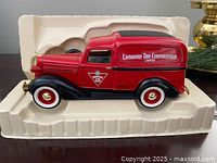 Left side view of die-cast 1936 Dodge Canadian Tire delivery van in foam insert