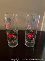 Front view of both highball glasses showing graphics