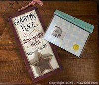 Sign and sealed photo album on tabletop