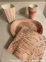 Group view of plate, cups, napkins and treat box