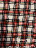 Close-up of plaid pattern showing colors and weave