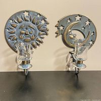 Pair of PartyLite Celestial sun and moon sconces with glass cups