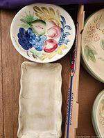 Fruit-motif bowl and rectangular platter