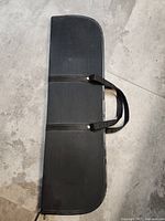 Closed black zippered carrying case