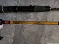 Gold Wonderglass rod blank with Shakespeare branding and cork handle section