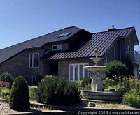 Image of house with metal roof illustrating Burke's Sheet Metal work