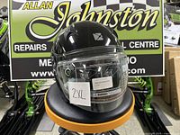 Front view of CKX VG977 DL helmet displaying visor, size tag, and exterior condition