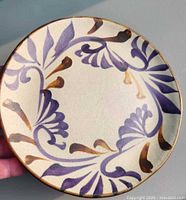 Front view showing full hand-painted design on plate