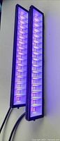 Two UV LED bars illuminated showing purple light