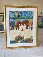 Front view of framed mixed-media artwork