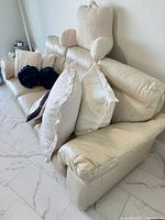Top angle highlighting back cushions and decorative pillows