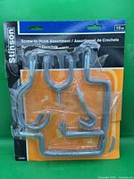 Front view of sealed Stinson 10-piece screw-in hook assortment