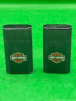 Front view of both dark green Harley-Davidson Ronson JetLite lighters