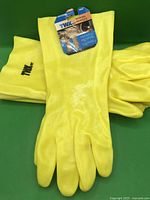 All three pairs stacked showing yellow PVC gloves