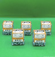 Front angled view of all five sealed packs