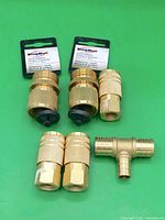 All six brass connectors on green background