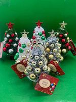 Group shot of all six tabletop Christmas trees