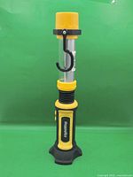 Front view of yellow/black Toolway LED worklight standing upright