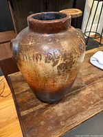 Front view showing inscription and glaze pattern