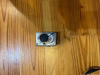Front view of Gateway DC-M42 camera on wooden surface