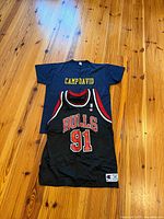 Both shirts laid flat, jersey front visible