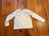 Sweater full front laid flat