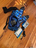 Overall lot showing fins, bag, masks, snorkel, boots, accessories