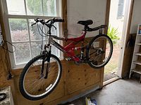 Right side view of entire bike hung on wall