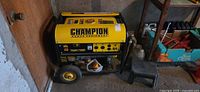 Overall front and side view of Champion portable generator showing frame, wheels and handle