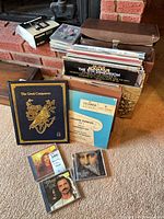 Overall lot showing Panasonic recorder, stack of CDs, record crate, cassette carry case and boxed record sets